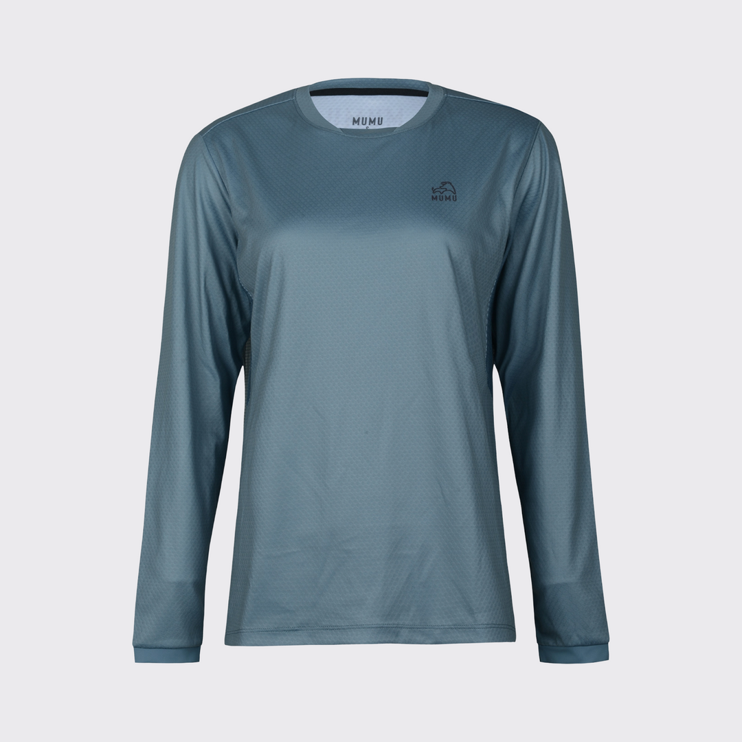 Slate blue long-sleeve MTB jersey with a relaxed fit, subtle textured fabric, crew neckline, and small black MUMU logo on the upper chest, shown against a light gray background.
