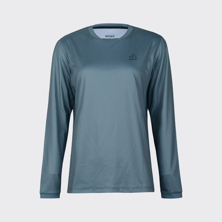 Slate blue long-sleeve MTB jersey with a relaxed fit, subtle textured fabric, crew neckline, and small black MUMU logo on the upper chest, shown against a light gray background.
