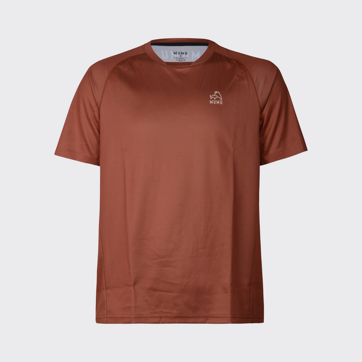 Rust brown short-sleeve MTB jersey with a relaxed fit, crew neckline, subtle textured performance fabric, and small light MUMU logo on the upper chest, shown against a light gray background.
