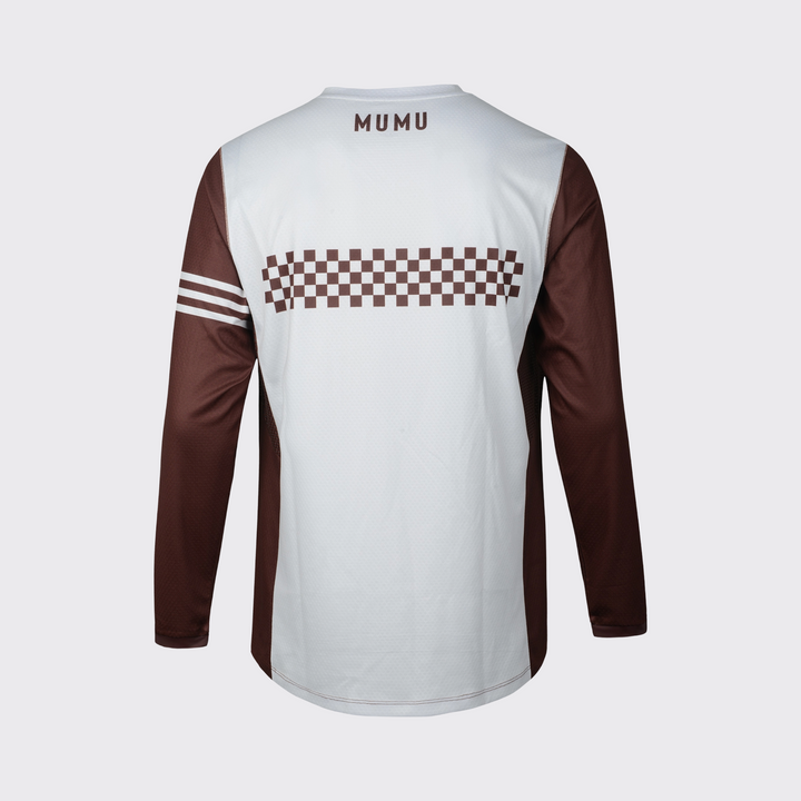 White and brown long-sleeve MTB jersey shown from the back, featuring a relaxed fit, brown sleeves and side panels, a brown checkered graphic across the upper back, three white sleeve stripes, brown MUMU branding below the collar, and a slightly extended rear hem, shown against a light gray background.
