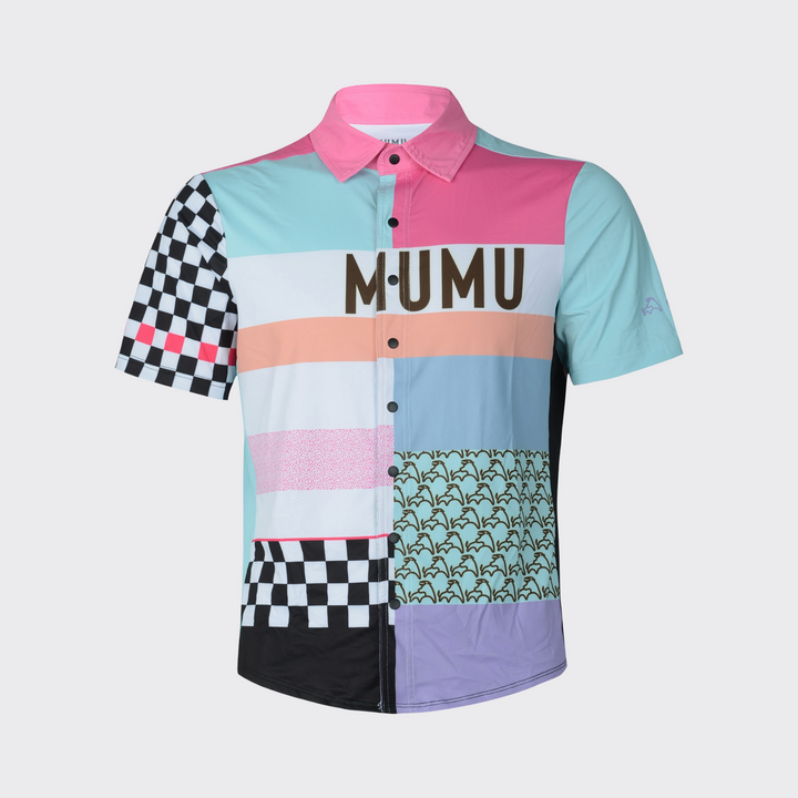 Short-sleeve button-down shirt with a colorful patchwork design featuring pink, teal, blue, peach, lavender, black-and-white checkerboard panels, repeated MUMU logos, and large MUMU lettering across the chest.