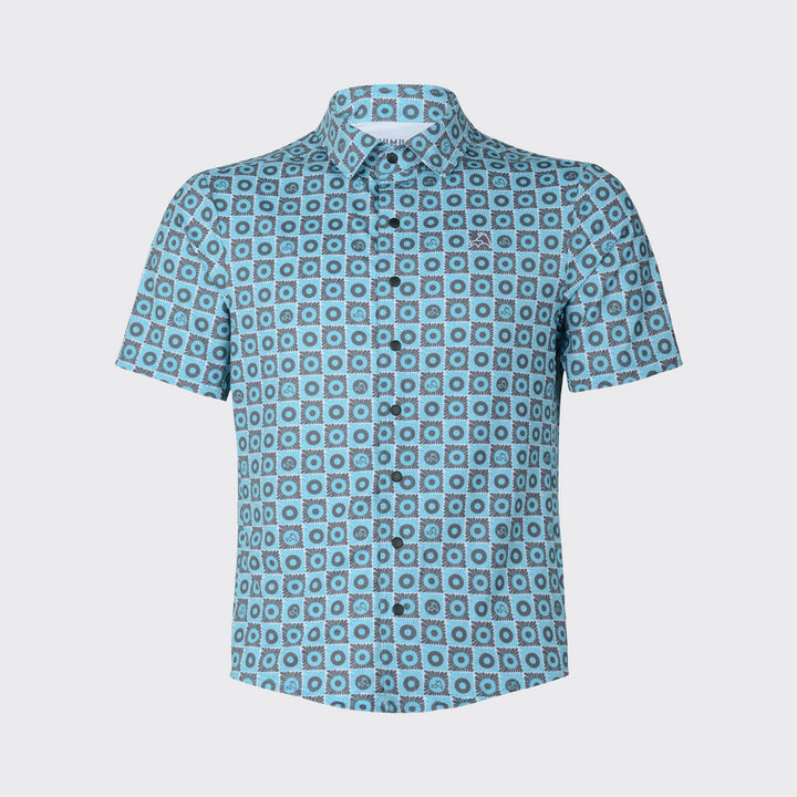 Short-sleeve MUMU button-down shirt with an all-over blue and gray geometric floral pattern, black buttons, and subtle MUMU logos incorporated throughout the design.